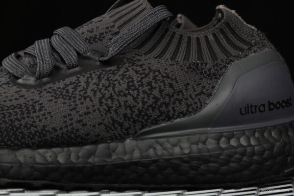 Adidas Ultra Boost Uncaged LTD Triple Black BA7996 socks and shoes - Image 4