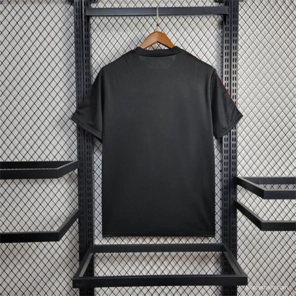 25/26 Manchester United New Year Training Black/Red Jersey - Image 2